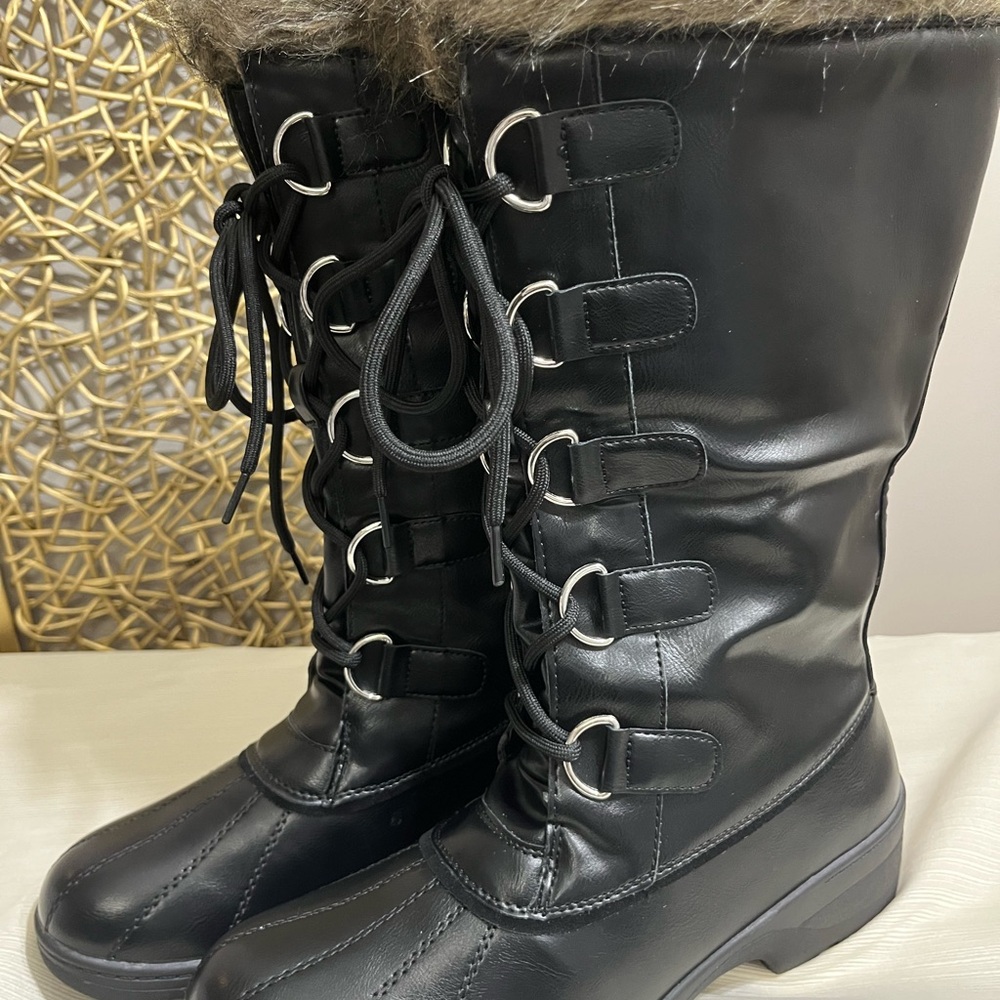 Size 10w Black boots with faux fur. New with tags. Wide calf